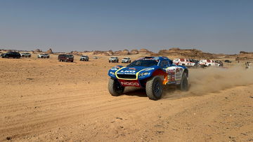 Video: Motorcyclist breaks leg in crash with car at Dakar Rally