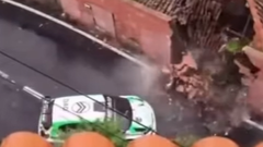 Building collapses after astonishing rally crash