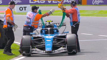 Stricken F1 car at pit entry triggers red flag stoppage