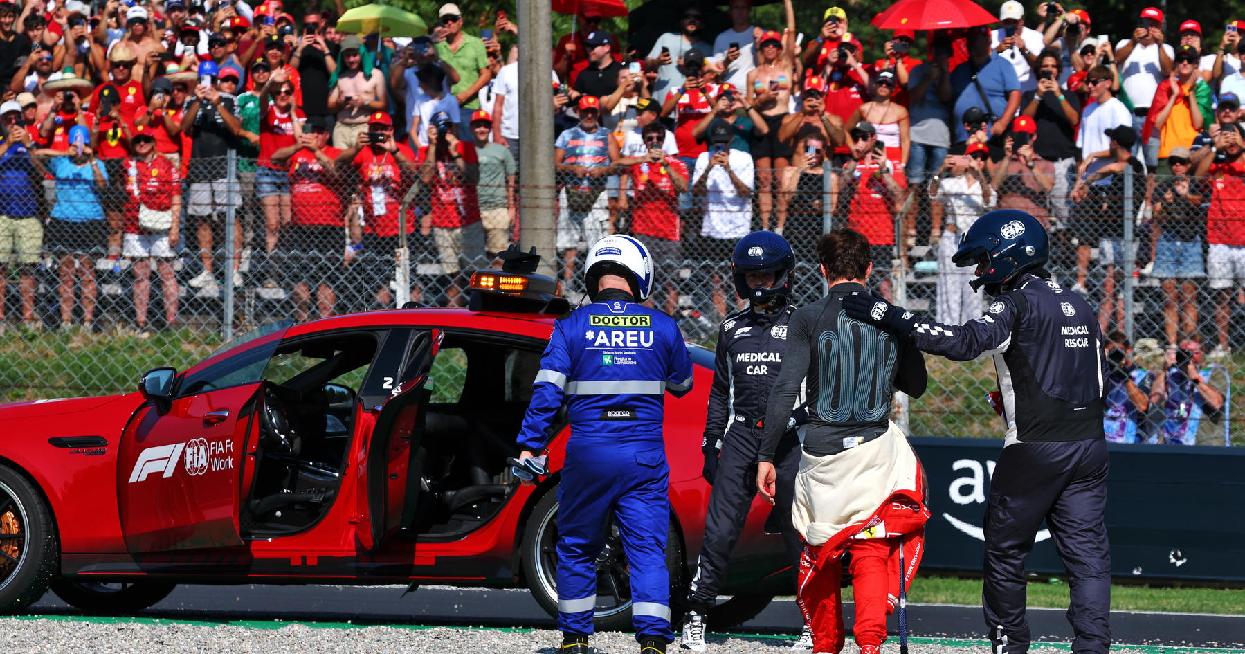 George Russell annuncia penalità al grid, Alonso non darà comunicato su ritiro, Leclerc dopo incidente a Monza, immagine di approfondimento