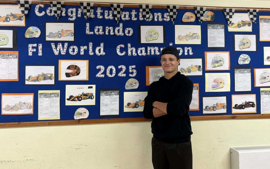 Norris visits old school