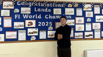 Norris visits old school