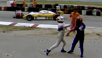 F1 champion attacks rival in bizarre incident - On This Day