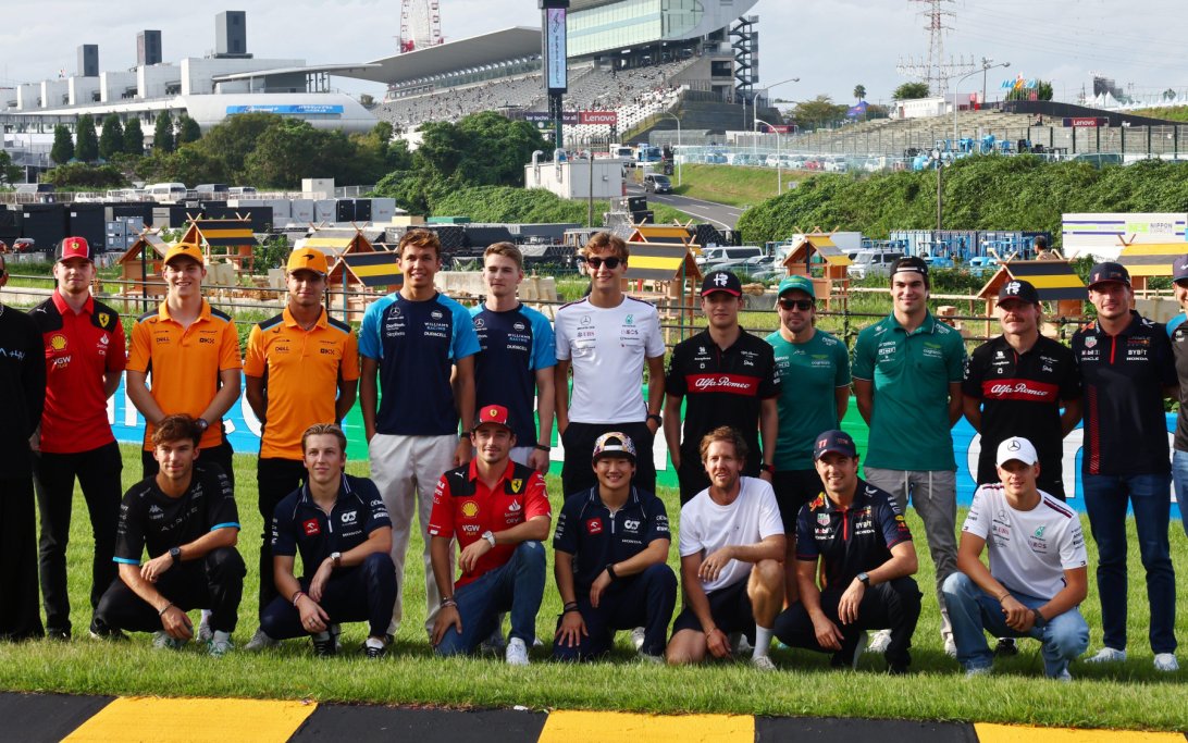 Drivers Vettel Bee buzzing corner Japan