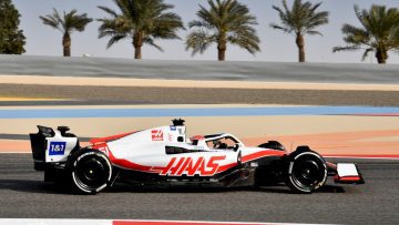 Which car hit the highest top speed on the first day of Bahrain testing?