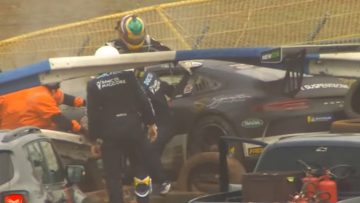 Porsche driver smashes through guardrail in heavy crash