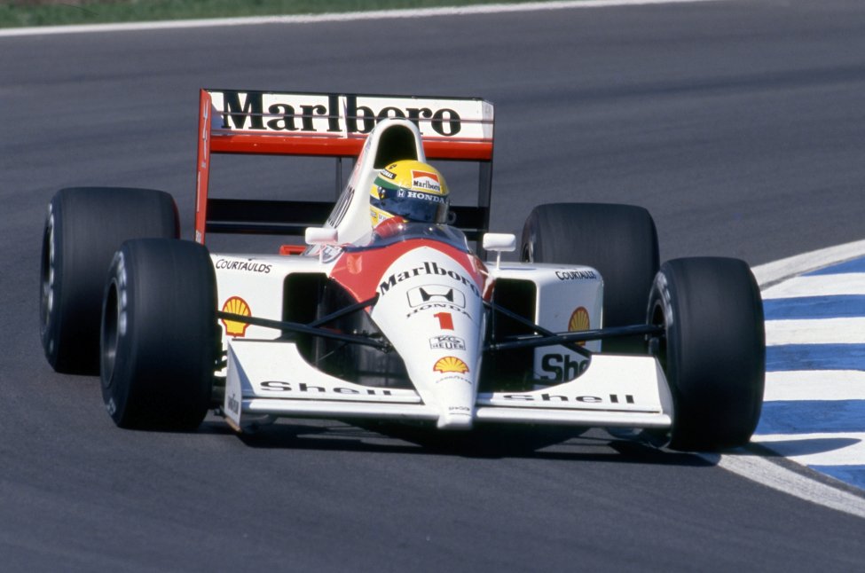 Three times Formula 1 World Champion Ayrton Senna from Brazil drivers his McLaren F1 car around a race track