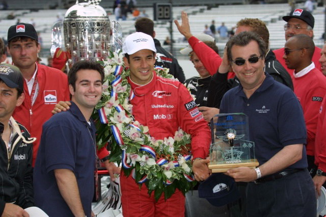 Hélio Castroneves celebrating his 2001 Indianapolis 500 win.
